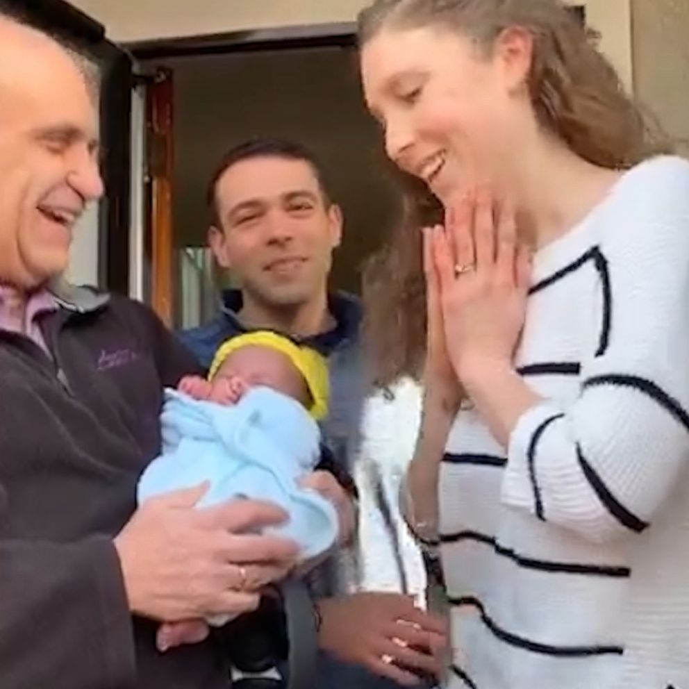 VIDEO: Fellow firefighters play stork to deliver adopted baby