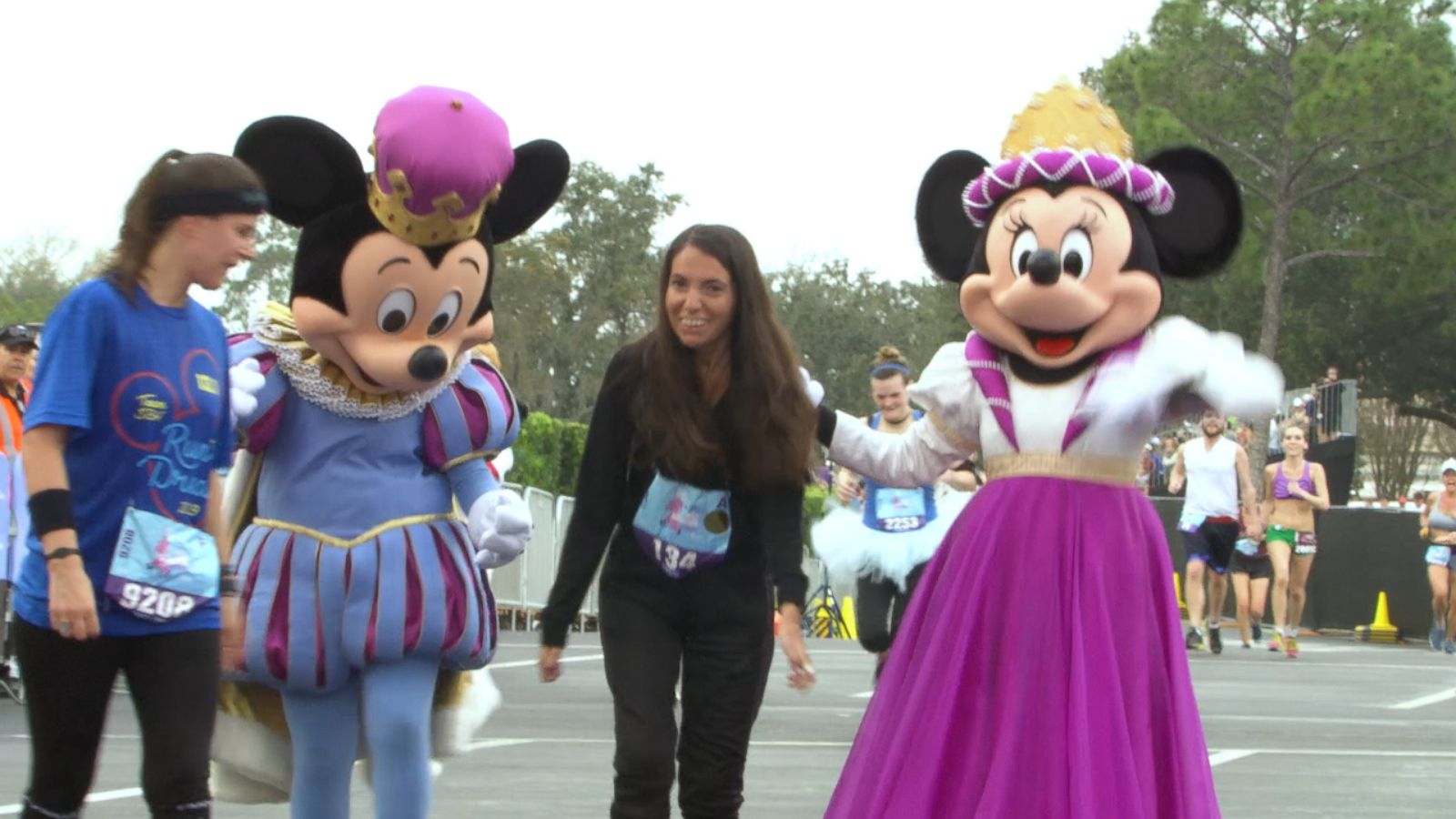 VIDEO: Woman paralyzed by autoimmune neurological disorder crosses finish line at Disney half marathon