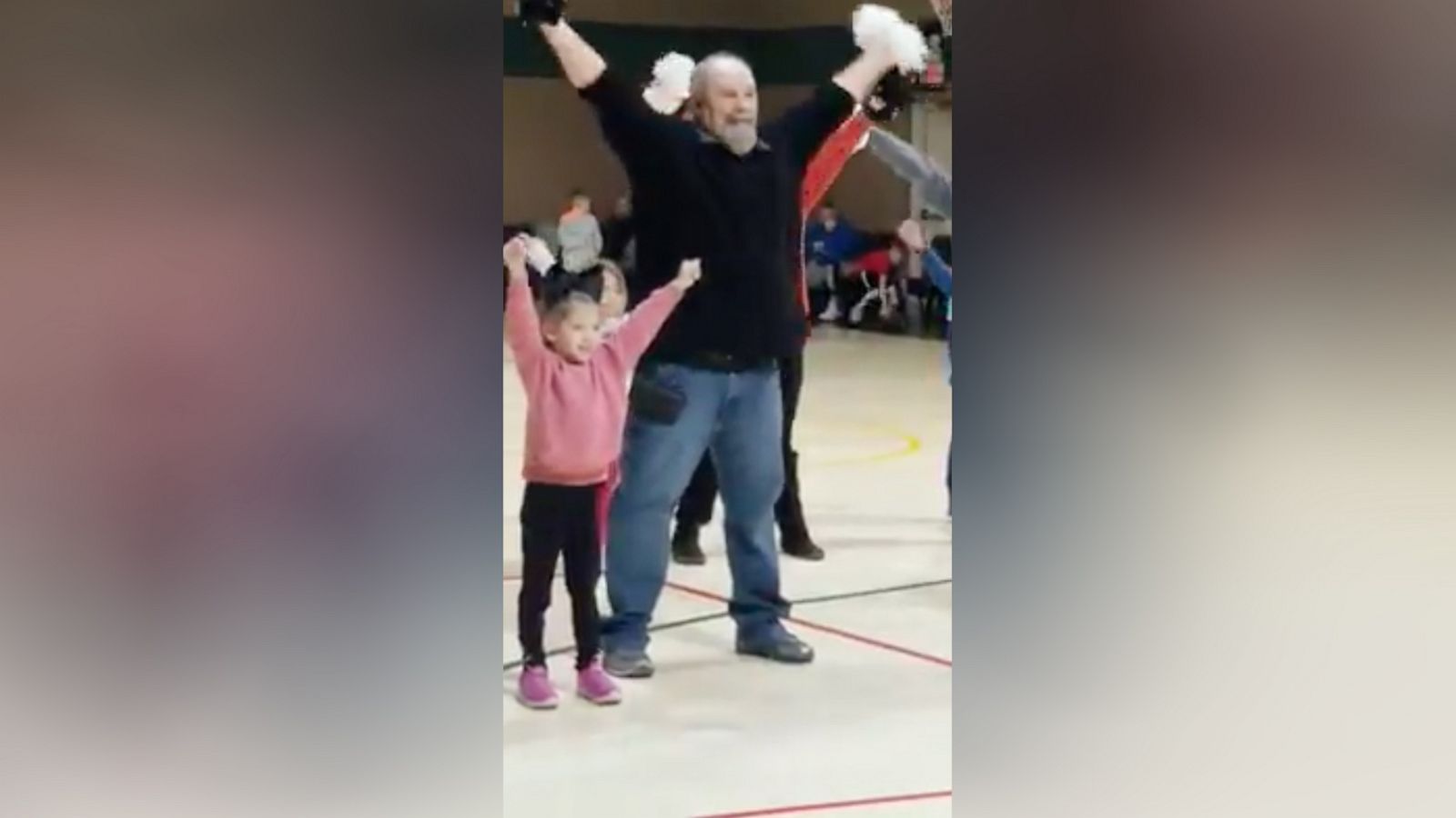 VIDEO: Grandpa wins hearts as dances with pom poms for granddaughter