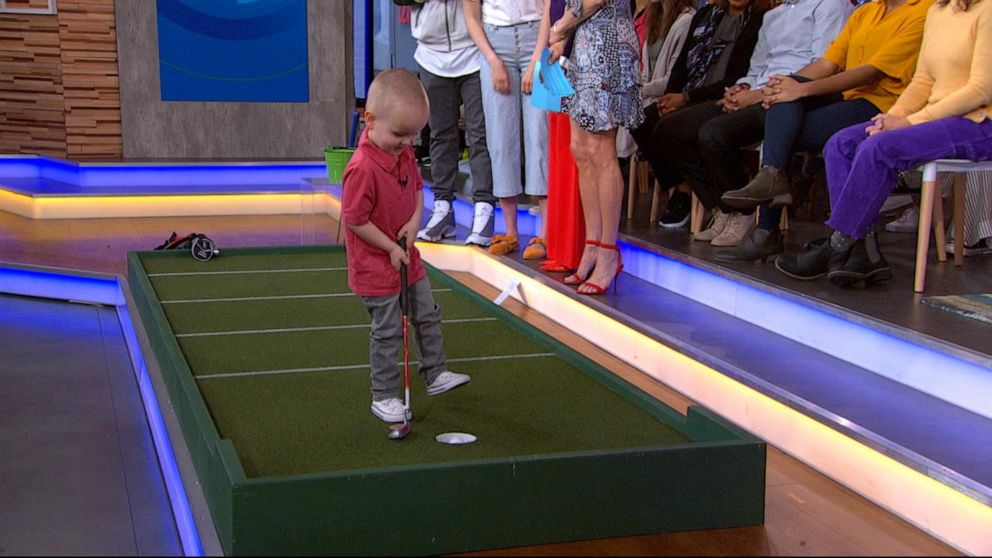 PHOTO: Dax Whittaker taps in a putt on "Good Morning America."