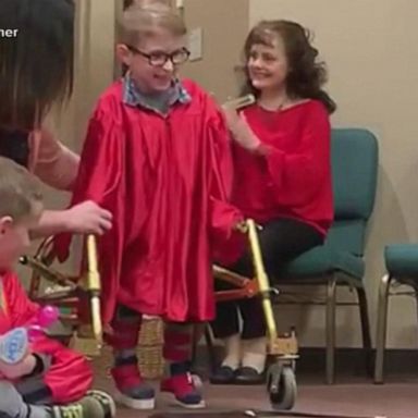 VIDEO: 5-year-old with Spina Bifida walks across graduation stage