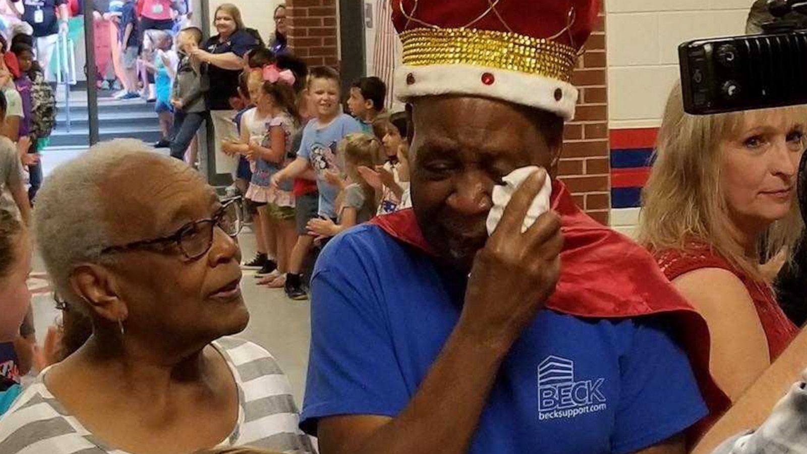 VIDEO: Children make 83-year-old janitor 'king' for a day