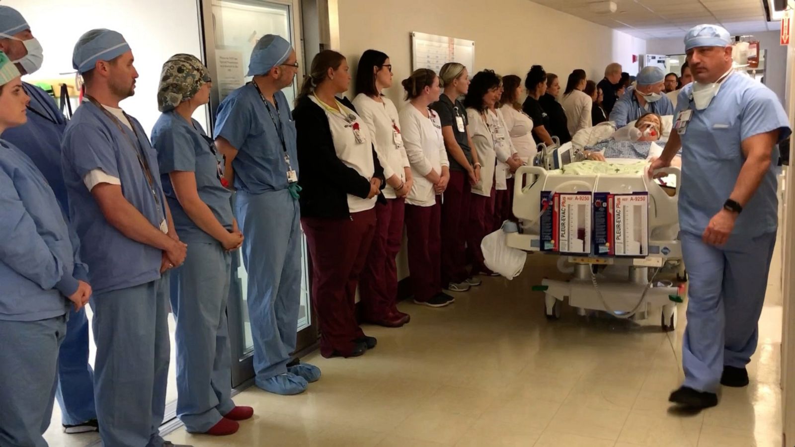 VIDEO: Over 100 hospital employees line halls to honor late nurse who became an organ donor