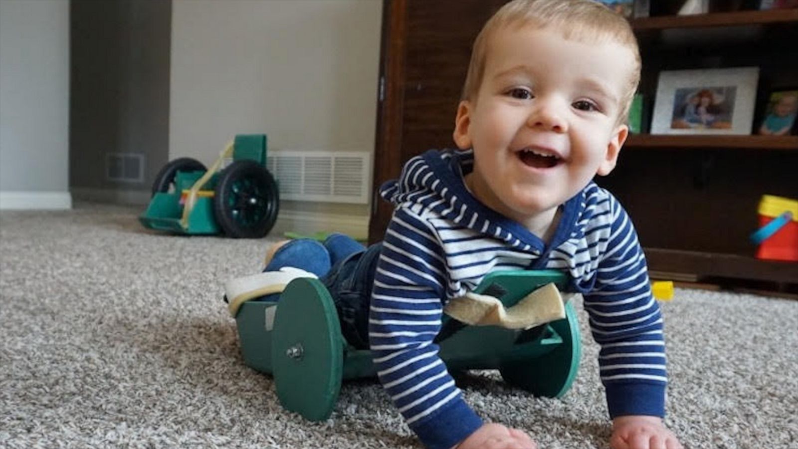 VIDEO: 2-year-old unable to crawl now cruising thanks to dad's smart invention