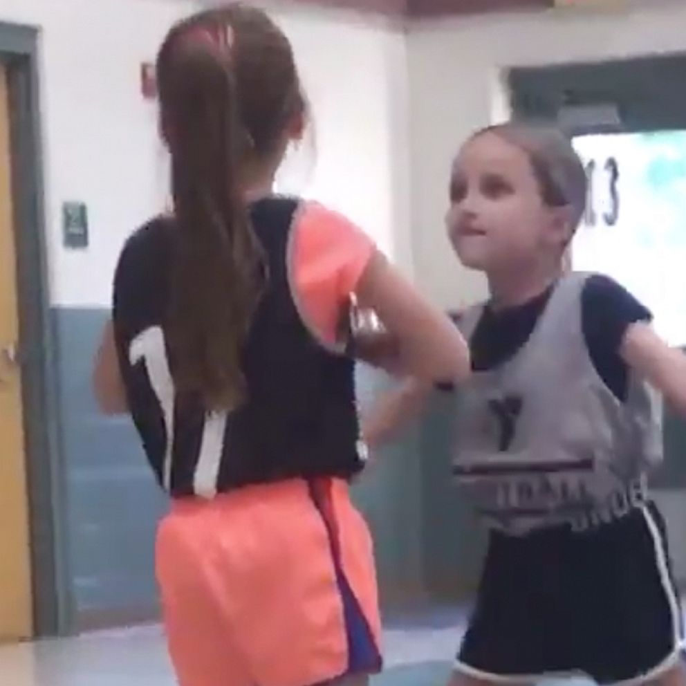 VIDEO: 6-year-old takes dad's 'stay on defense' advice at her first basketball practice