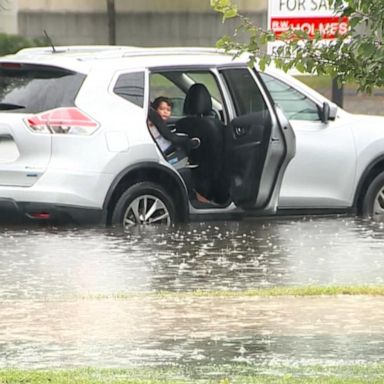 VIDEO: Flash floods trap families in severe summer storms