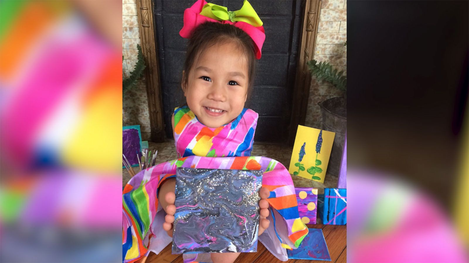 VIDEO: Girl born without arms makes paintings all by herself