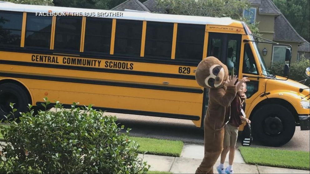 PHOTO: VIDEO: Brother dresses up in costumes to greet younger brother after school