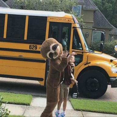 PHOTO: VIDEO: Brother dresses up in costumes to greet younger brother after school