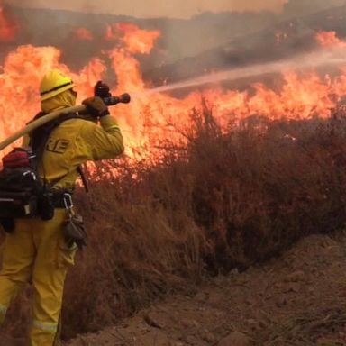 VIDEO: Southern California wildfire closes in on homes