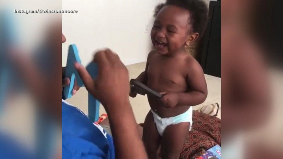 VIDEO: Baby cracks up with dad while learning alphabet