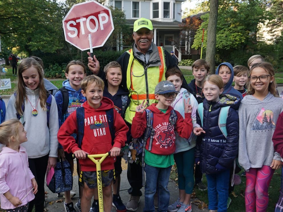 Elementary school patrol kids guarding the corners for safety. St