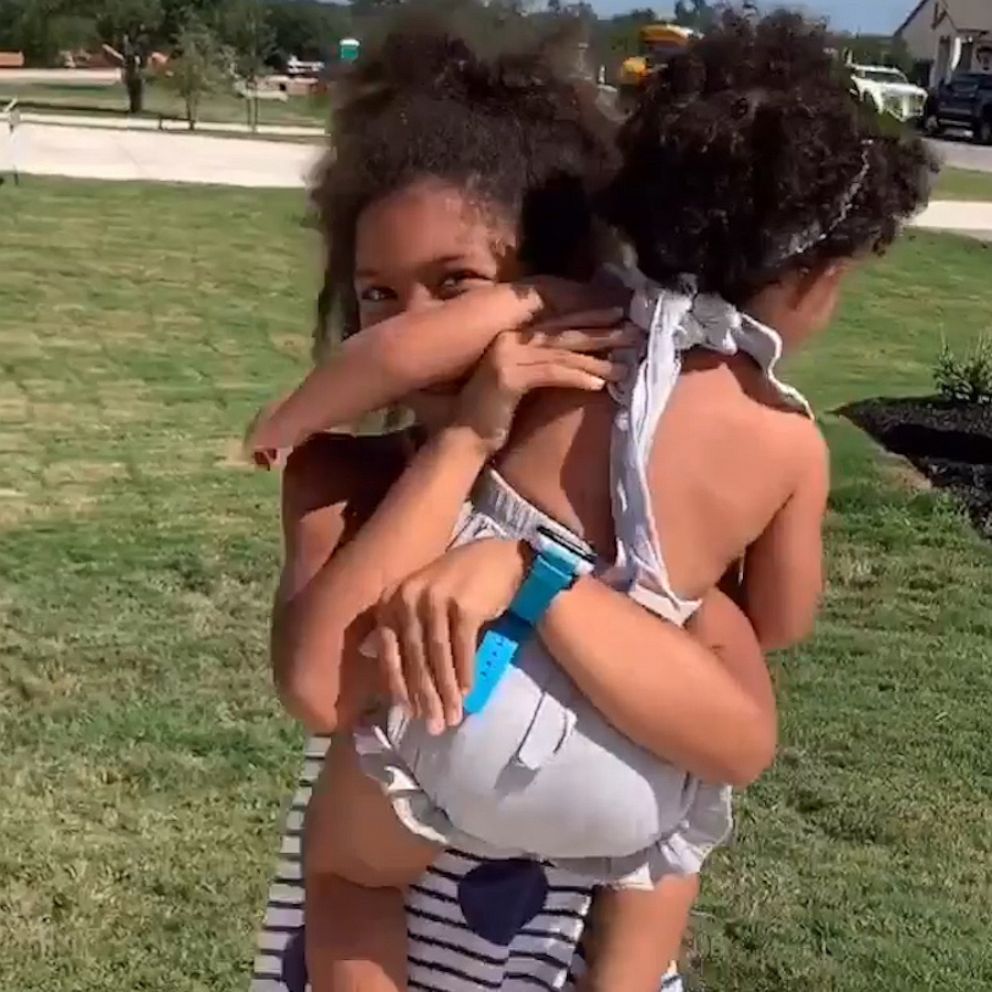 VIDEO: 1-year-old waits outside each day to hug sister 
