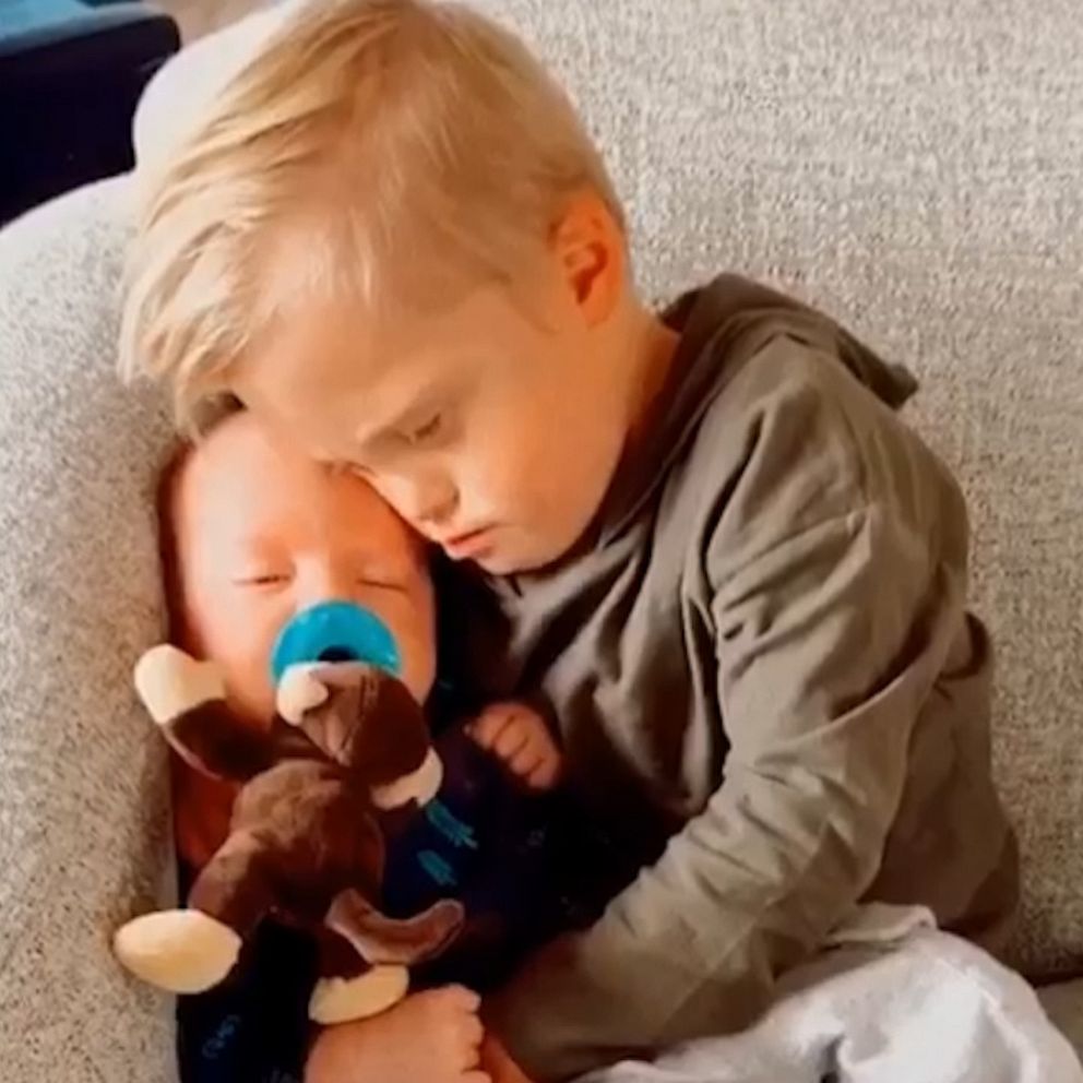 VIDEO: This toddler comforting his baby brother is too cute