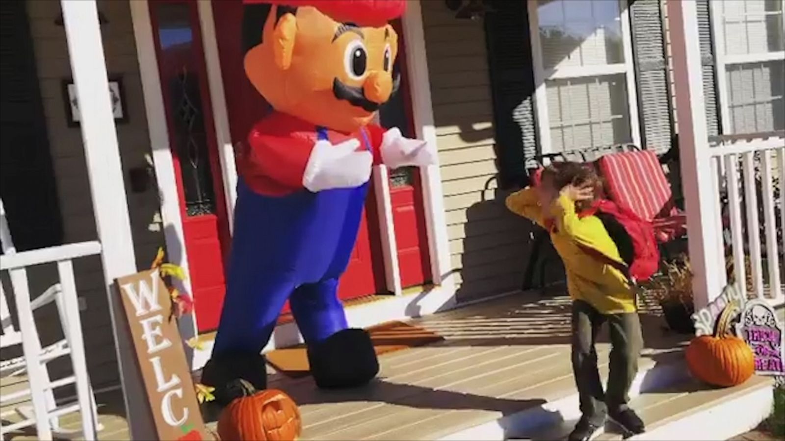 VIDEO: Mom hides in Super Mario blow up to scare her kid in epic Halloween prank