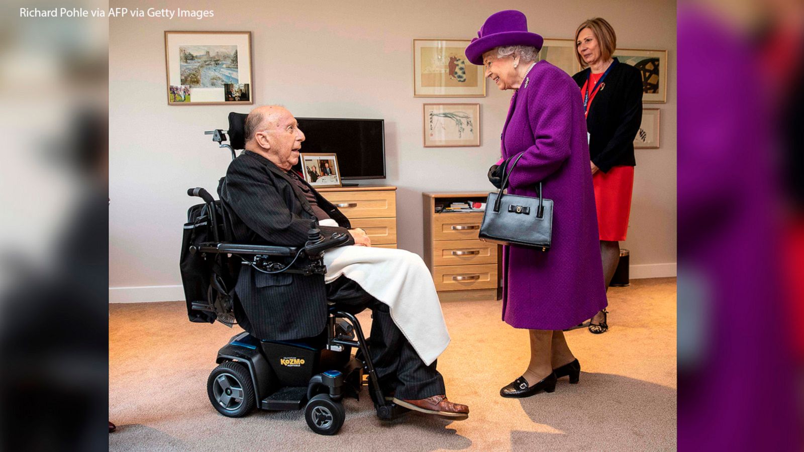 VIDEO: Queen Elizabeth meets 99-year-old WWII veteran John Riggs on a visit to open a British senior care center