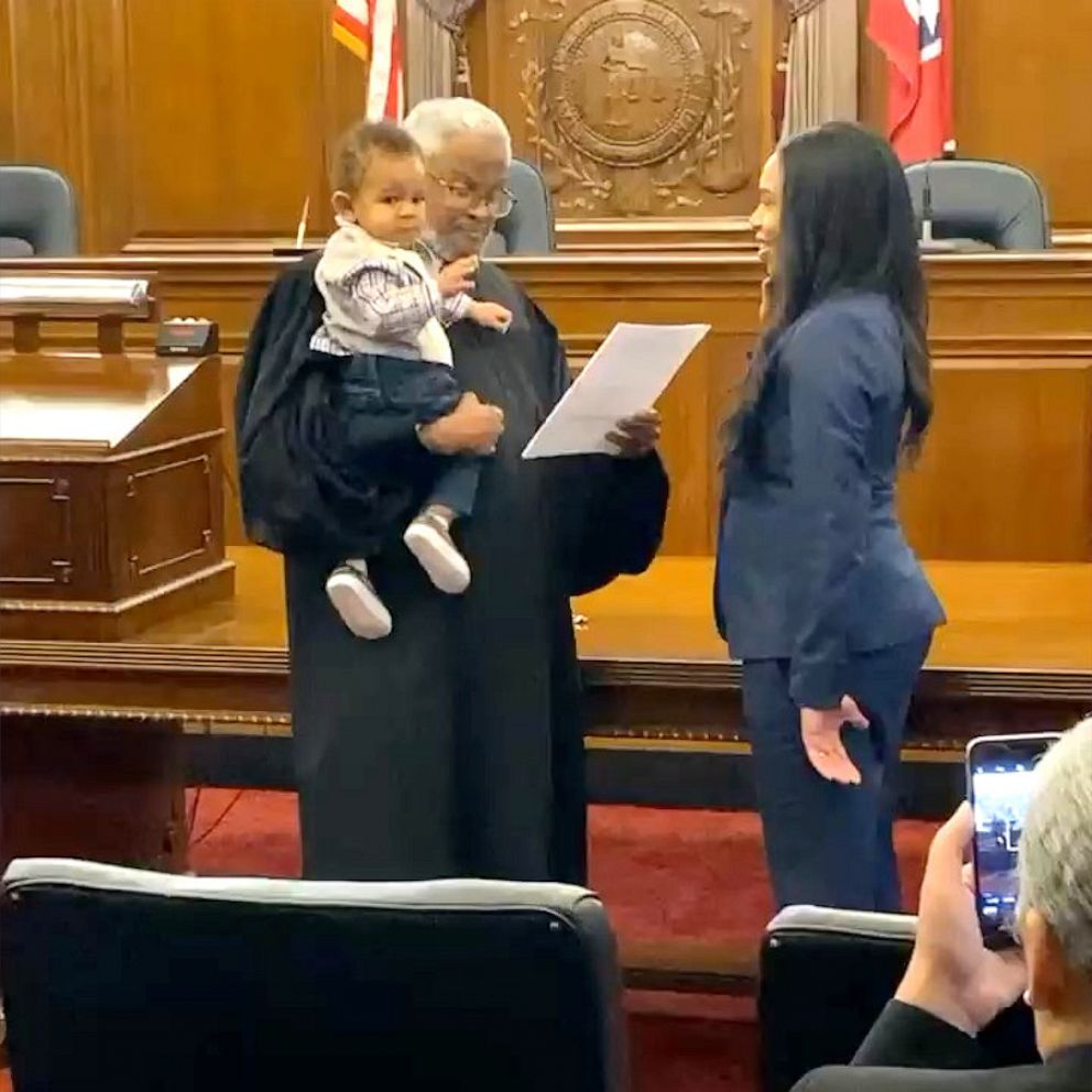 VIDEO: Judge holds baby as mom is sworn in as lawyer