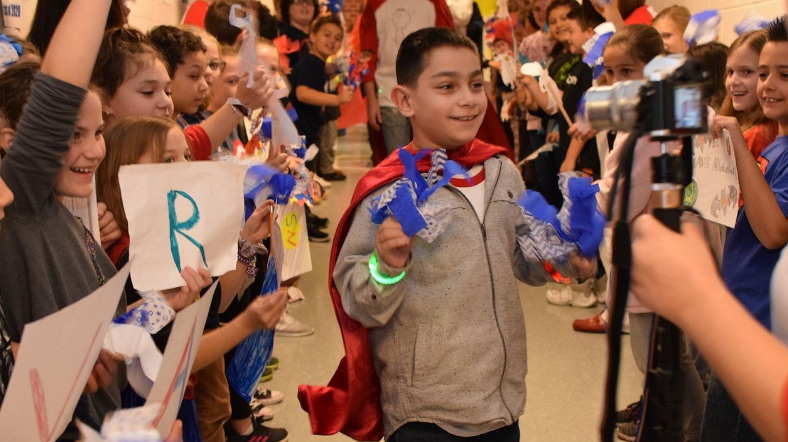 PHOTO: Nicholas Corapi walks the hallway of Hopedale Memorial.