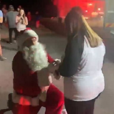 VIDEO: Firefighter dressed as Santa asks girlfriend to marry him 