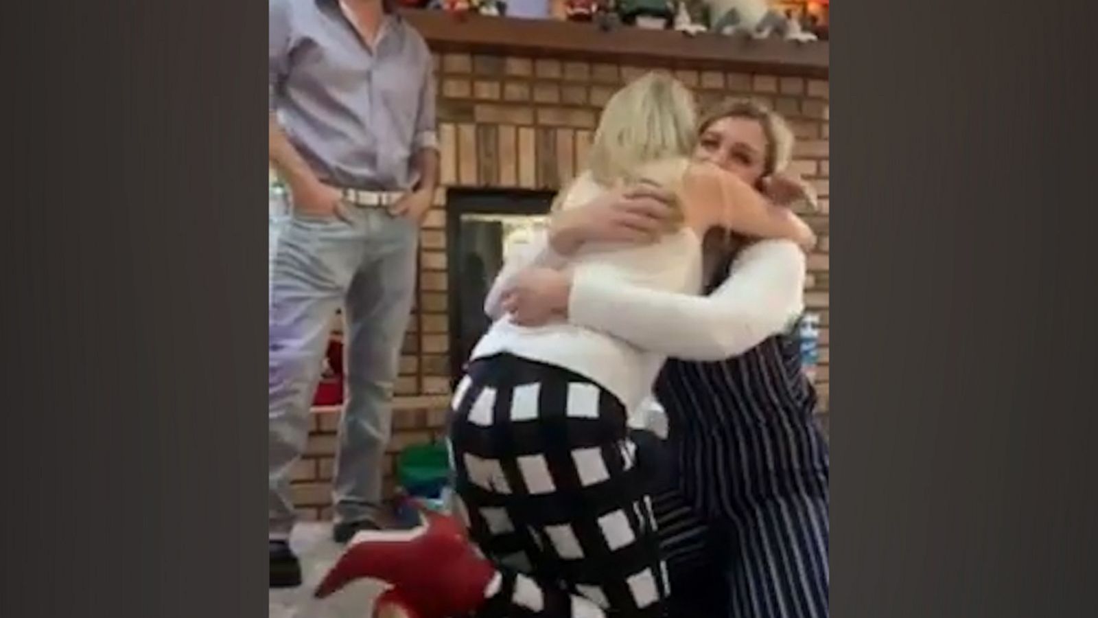 VIDEO: Emotions all around as woman gifts her stepmom with adoption papers