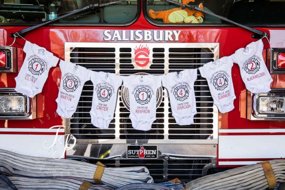 PHOTO: Brianna Mitschele made a onesie for all seven of the new babies for a photo shoot at the City of Salisbury Fire Department.
