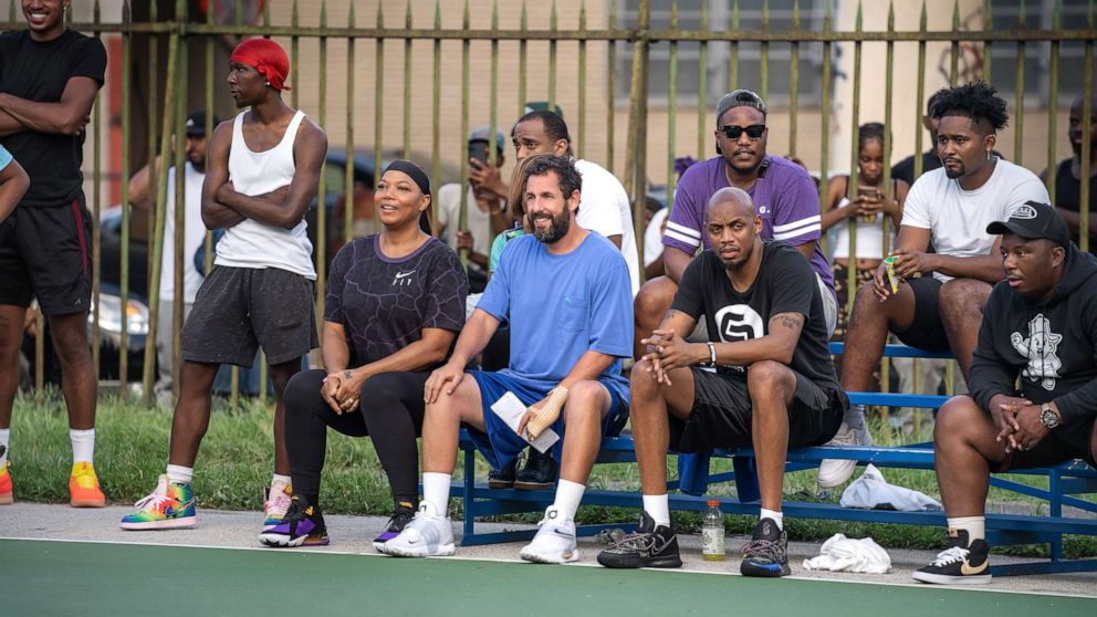 Queen Latifah as Teresa Sugerman and Adam Sandler as Stanley Sugerman are pictured in a scene from "Hustle," airing on Netflix in June, 2022.