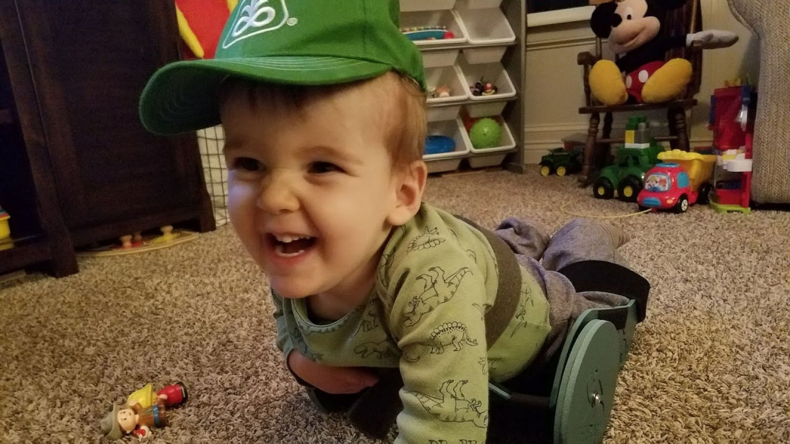 PHOTO: Brody Moreland is cruising around the house, playing with his tractor toys and chasing the family cat thanks to "the Frog" -- a device created by his father.