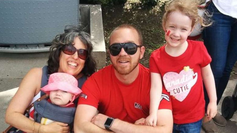 PHOTO: Sarah and Kevin Keast are pictured with their two daughters.