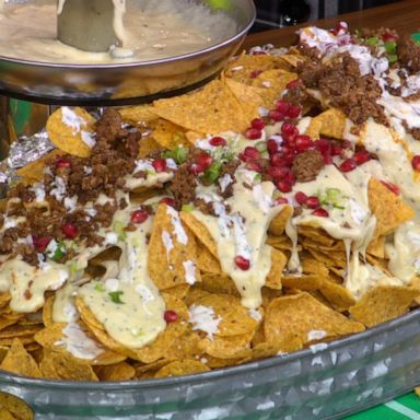 VIDEO: These nachos are game day goals thanks to a cheese fountain