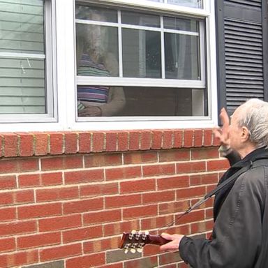 VIDEO: Man sings outside nursing home window to longtime girlfriend 