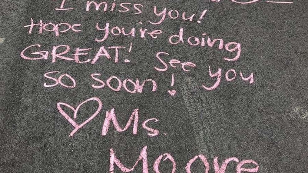 PHOTO: Two teachers from Rosemount Apple Valley Eagan Public Schools visited the kids from their class and wrote chalk messages. 