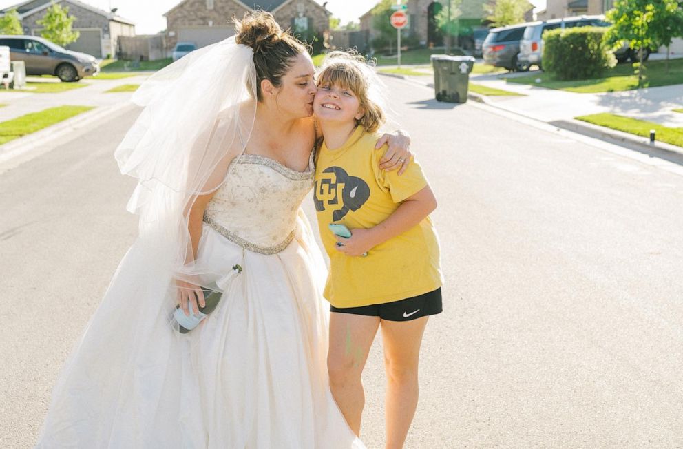 PHOTO: Jamie Egloff poses with her daughter for “wedding dress Wednesday."