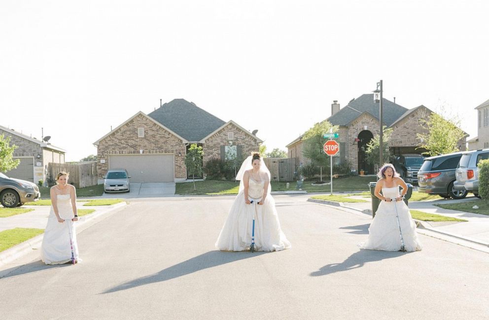PHOTO: These six neighbors were took part in “wedding dress Wednesday” to pass the time amid the coronavirus outbreak.