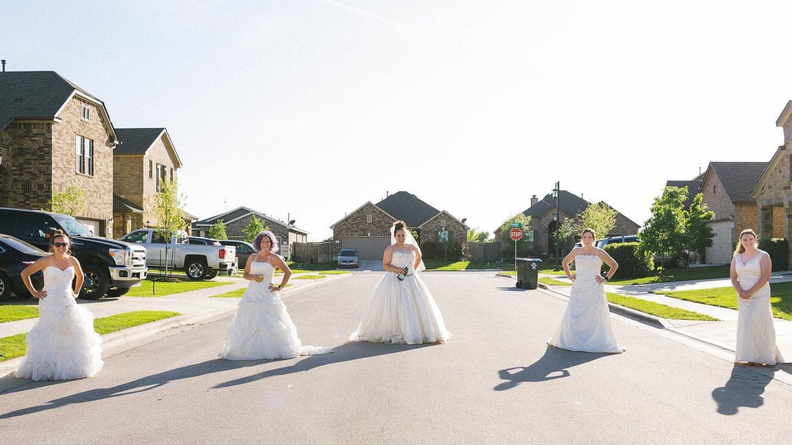 PHOTO: These six neighbors were part of a “wedding dress Wednesday” and appropriately distanced quarantine photoshoot on their Texas street.