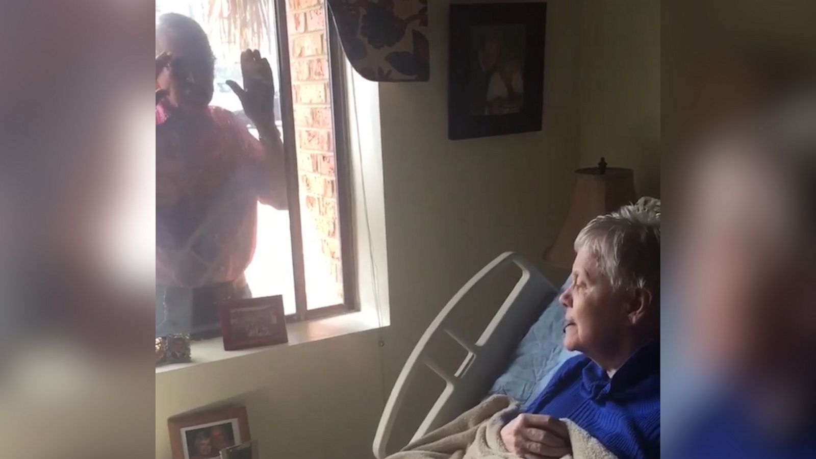 VIDEO: Husband serenades wife for three hours each day through her nursing home window