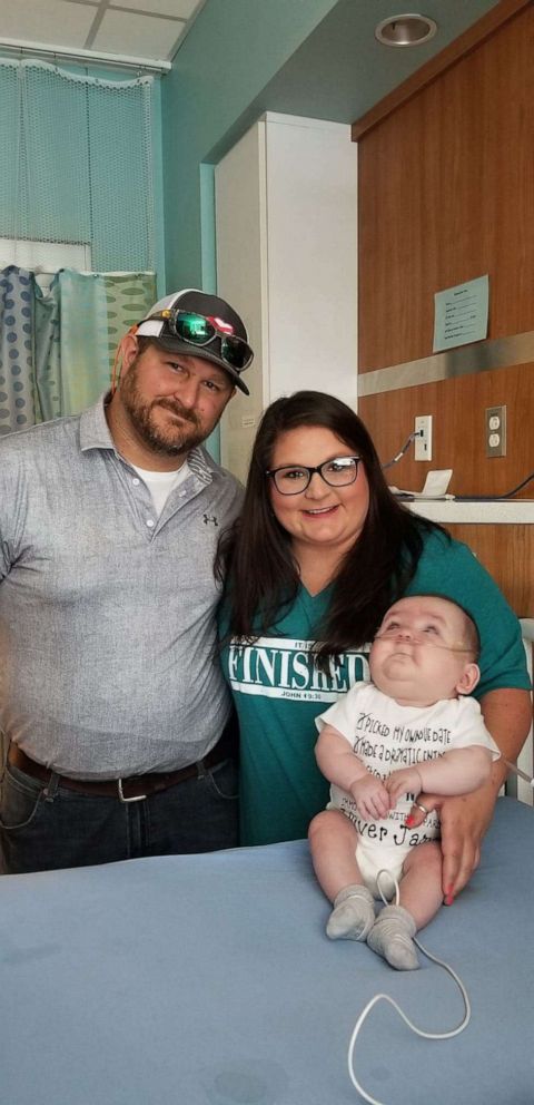 PHOTO: Parents Ricki Ann Gandy and Jeremy Sullivan with son Oliver.