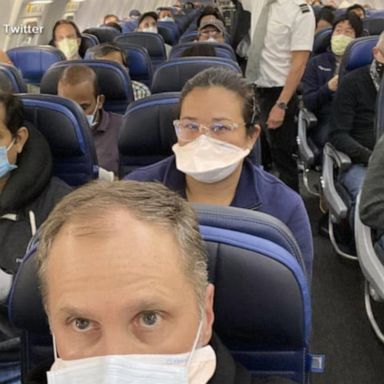 VIDEO: Doctor speaks out after viral photo of packed plane