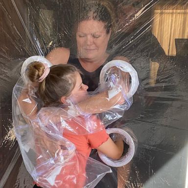 VIDEO: This girl created a curtain so should could hug her grandparents