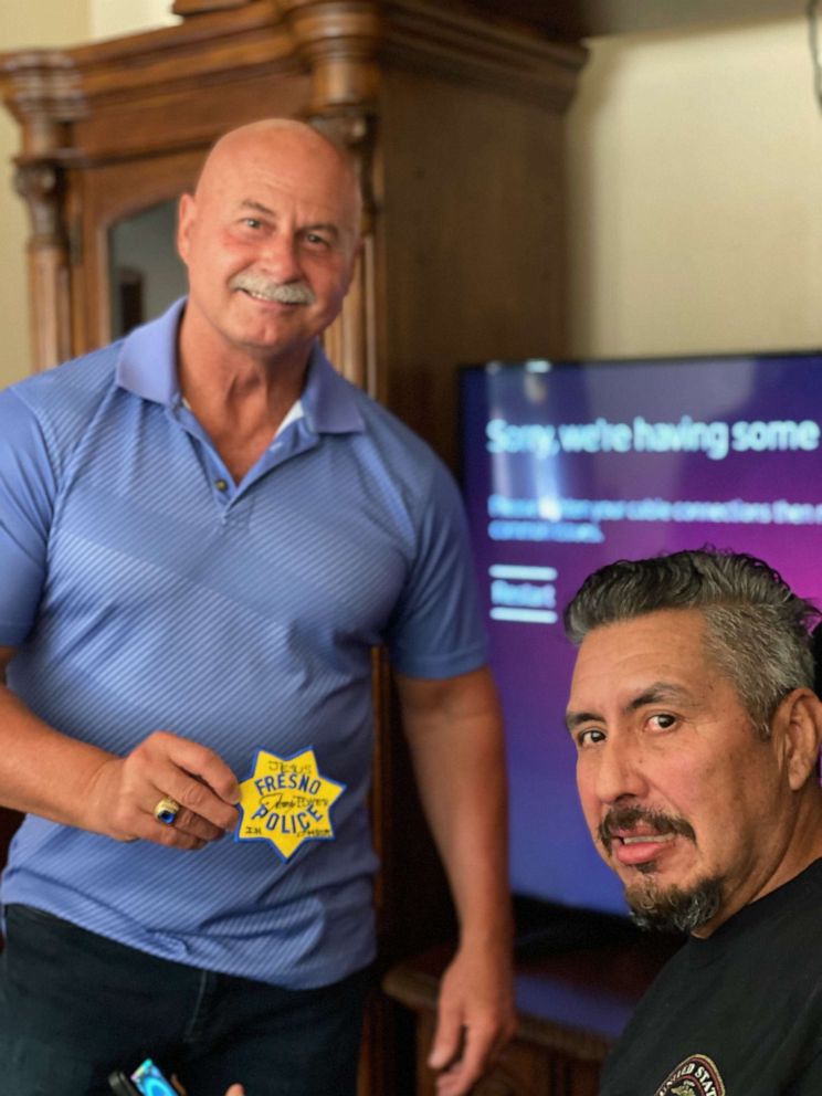 PHOTO: Mayor Jerry Dyer, who was the Fresno police chief for most of Salinas’ career, stopped by a few days after the parade to give the former officer one of his last police badges.