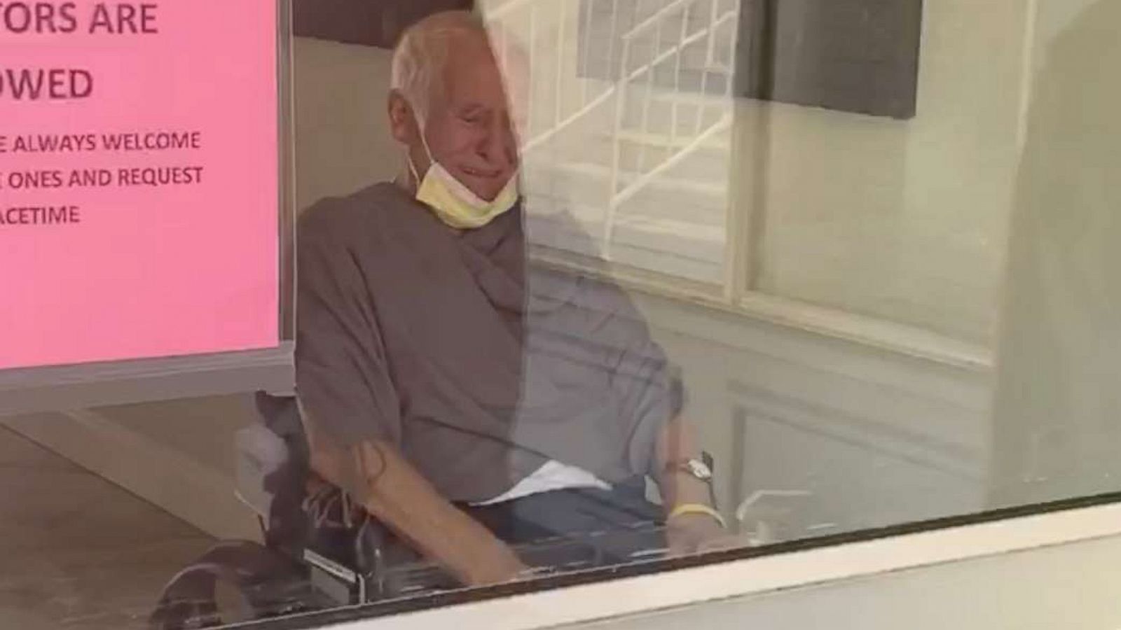 PHOTO: Hayrik Abnous, 86, burst into tears seeing his grandchildren in their graduation robes outside his nursing home window.