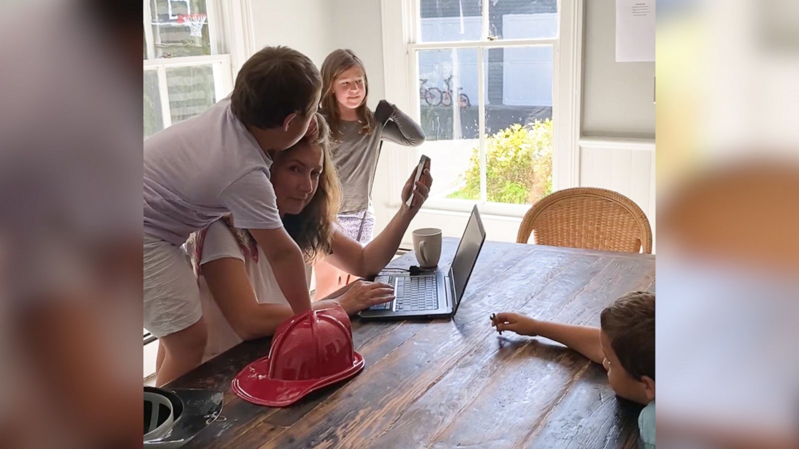 VIDEO: Working from home mom gets interrupted on conference call by her kids 27 times in 10 minutes