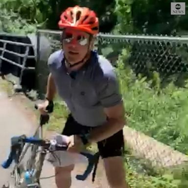 VIDEO: Cyclist allegedly assaults group that was posting signs in support of George Floyd 