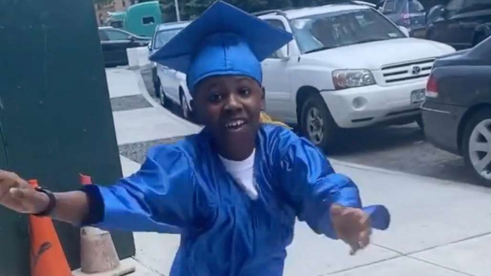 PHOTO: 13-year-old Ty Cash celebrated graduating middle school with some epic dance moves while rocking his cap and gown.