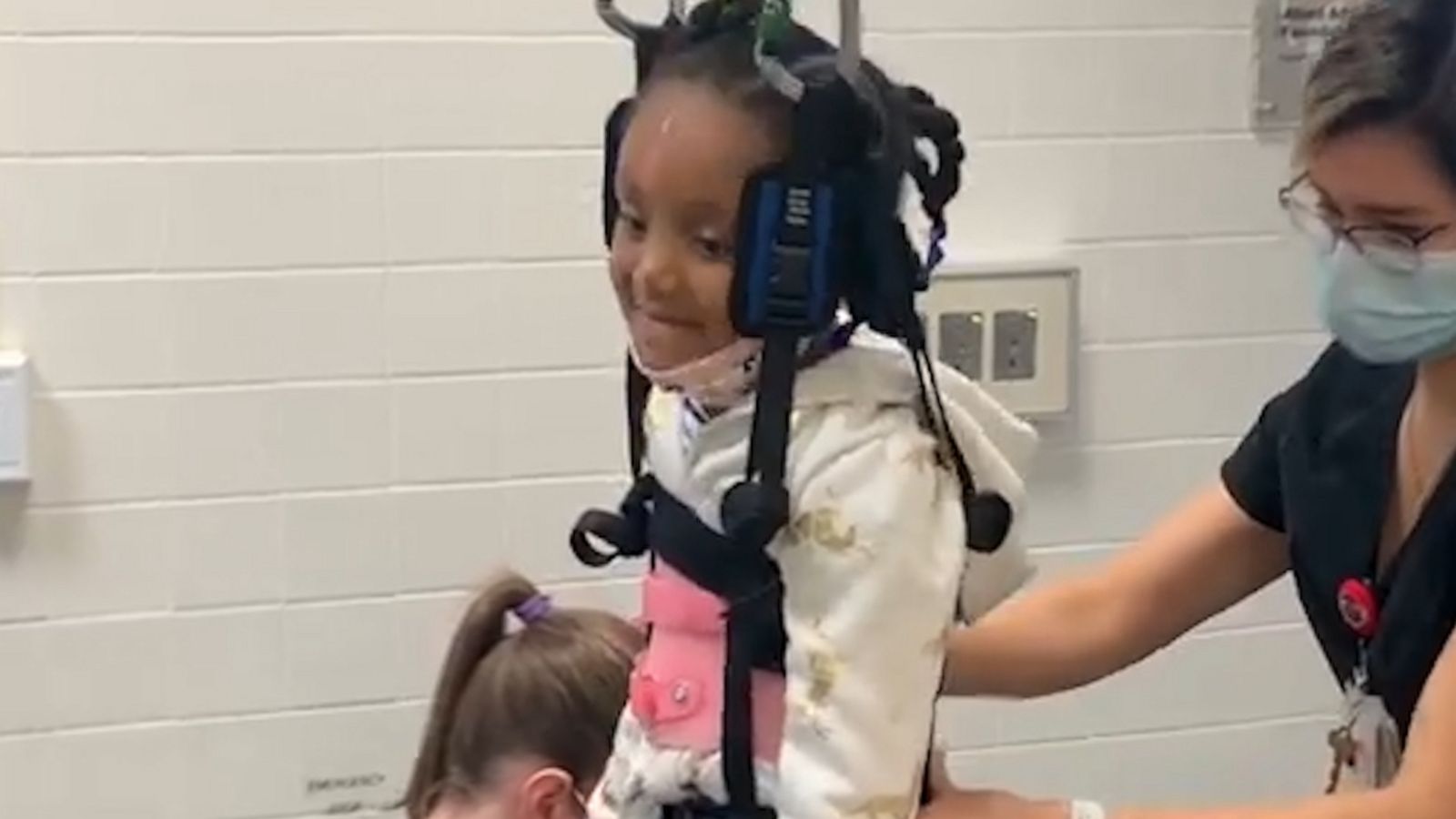 VIDEO: Girl with spinal injury sings along to 'Hollaback Girl' at physical therapy session