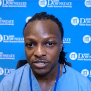 VIDEO: African American doctor wears scrubs as form of protection