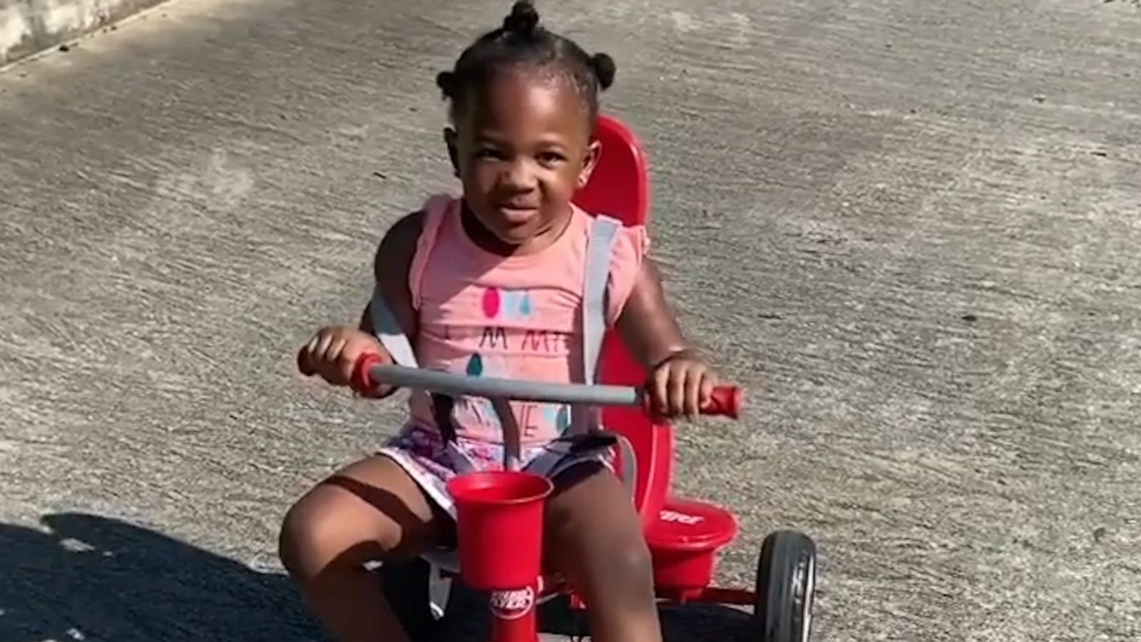 VIDEO: This 2-year-old's reaction to her first bike ride is precious