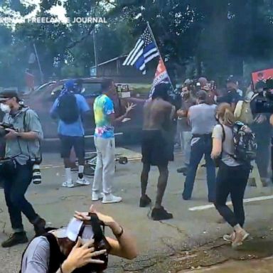 VIDEO: Armed militia groups face off against counter-protesters in Georgia