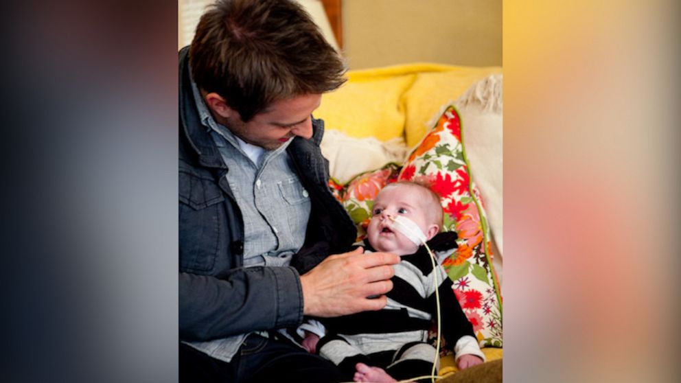 Bowen Hammitt as a newborn with his father, Matthew Hammitt.
