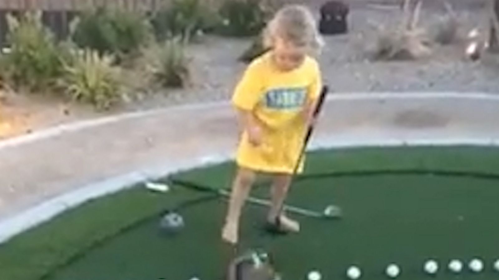 VIDEO: Boy's reaction to dog interrupting his golf game is all of us