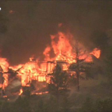 VIDEO: Wildfires burn out West as winds fuel the flames